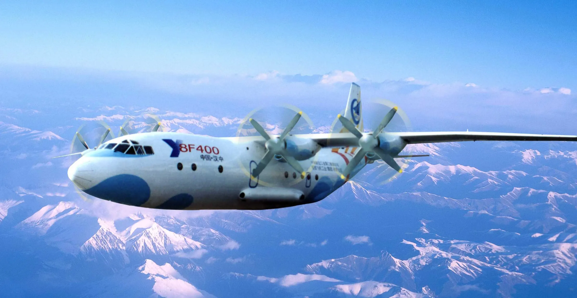 Y-8F400 in cruise above snow-covered mountains